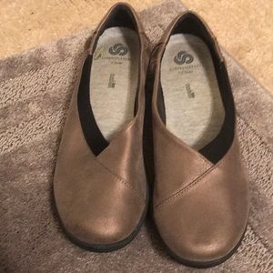 Gold metallic loafers style shoes